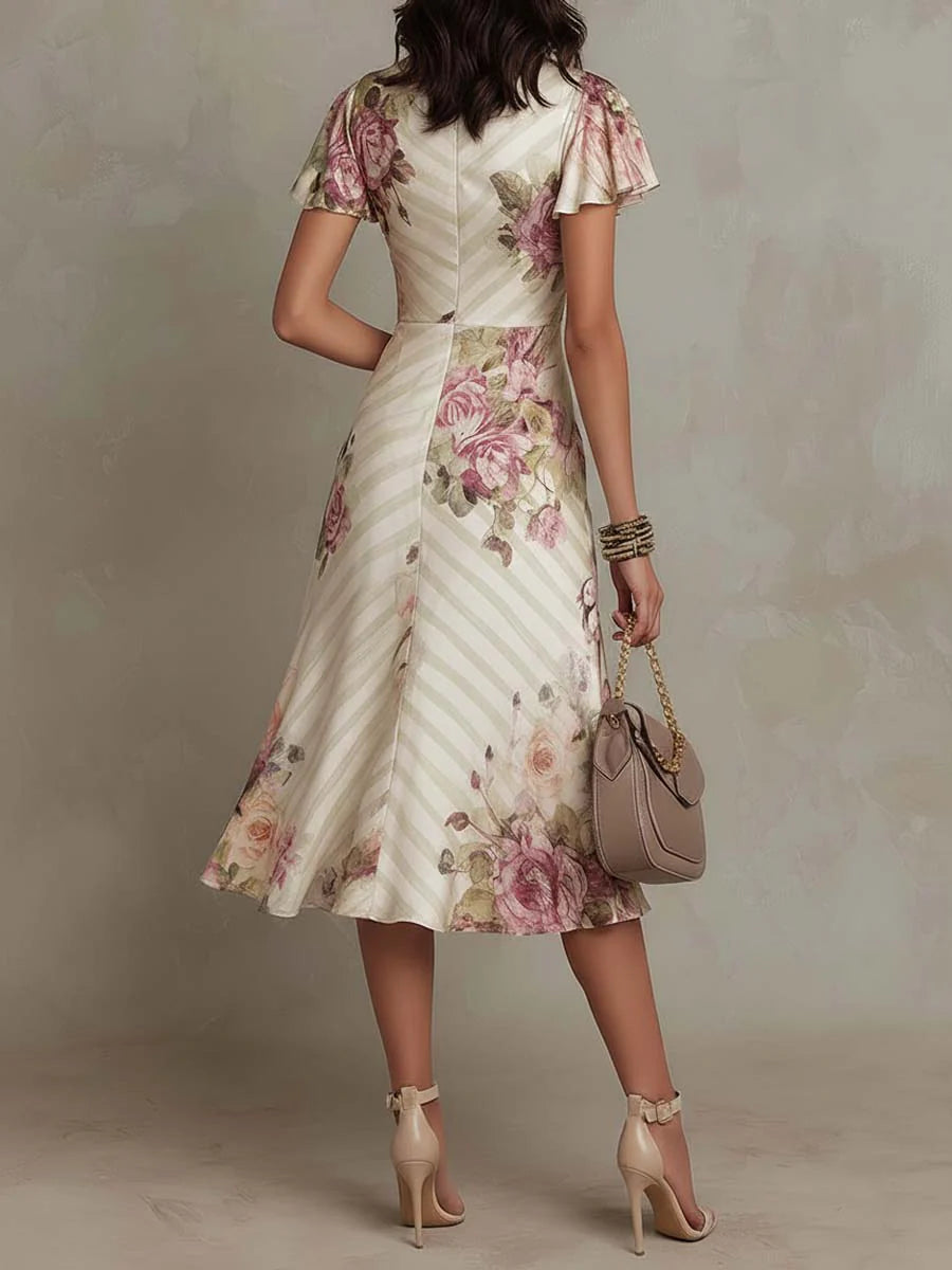 Macy | Elegante midi-jurk met retrobloemenprint